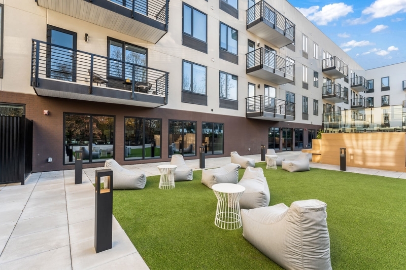 803 South Avenue, Unit 503 Plainfield, NJ 07062 - Photo 31 of 45 a view of a house with swimming pool and sitting area