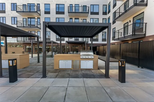 a view of a swimming pool with a lounge chairs