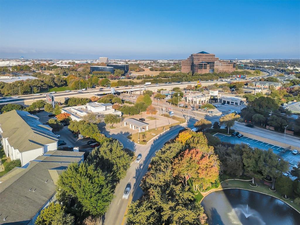 5200 Keller Springs Road, Unit 1315 Dallas, TX 75248 - Photo 19 of 40 an aerial view of residential houses with outdoor space