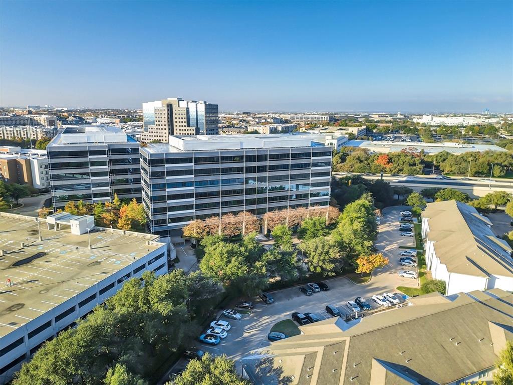 5200 Keller Springs Road, Unit 1315 Dallas, TX 75248 - Photo 21 of 40 a view of a city with tall buildings