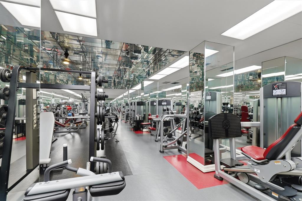 5200 Keller Springs Road, Unit 1315 Dallas, TX 75248 - Photo 28 of 40 a view of a room with gym equipment
