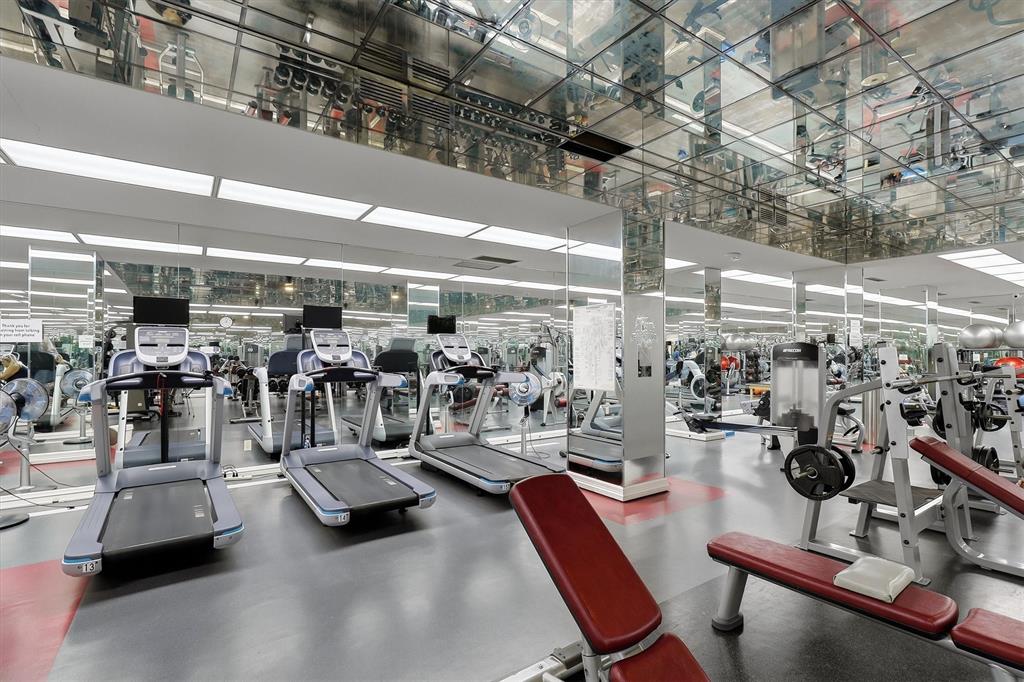 5200 Keller Springs Road, Unit 1315 Dallas, TX 75248 - Photo 29 of 40 a view of a room with gym equipment