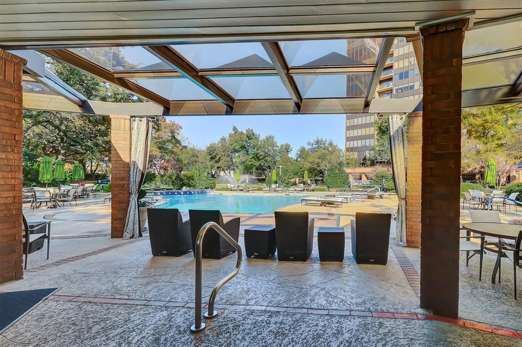 5200 Keller Springs Road, Unit 1315 Dallas, TX 75248 - Photo 36 of 40 a view of a porch with furniture and a yard