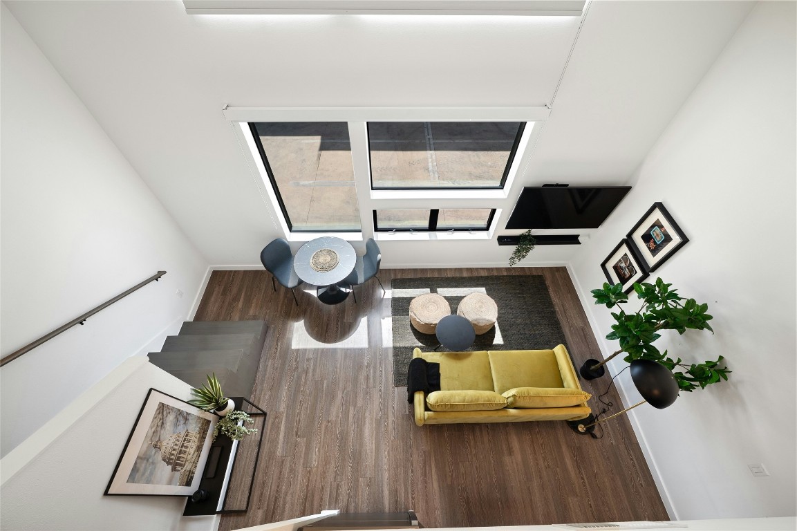 49 Navasota Street, Unit 216 Austin, TX 78702 - Photo 13 of 37 a view of living room with furniture and a painting