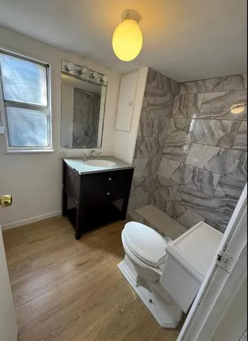 a view of a tree in front of a house