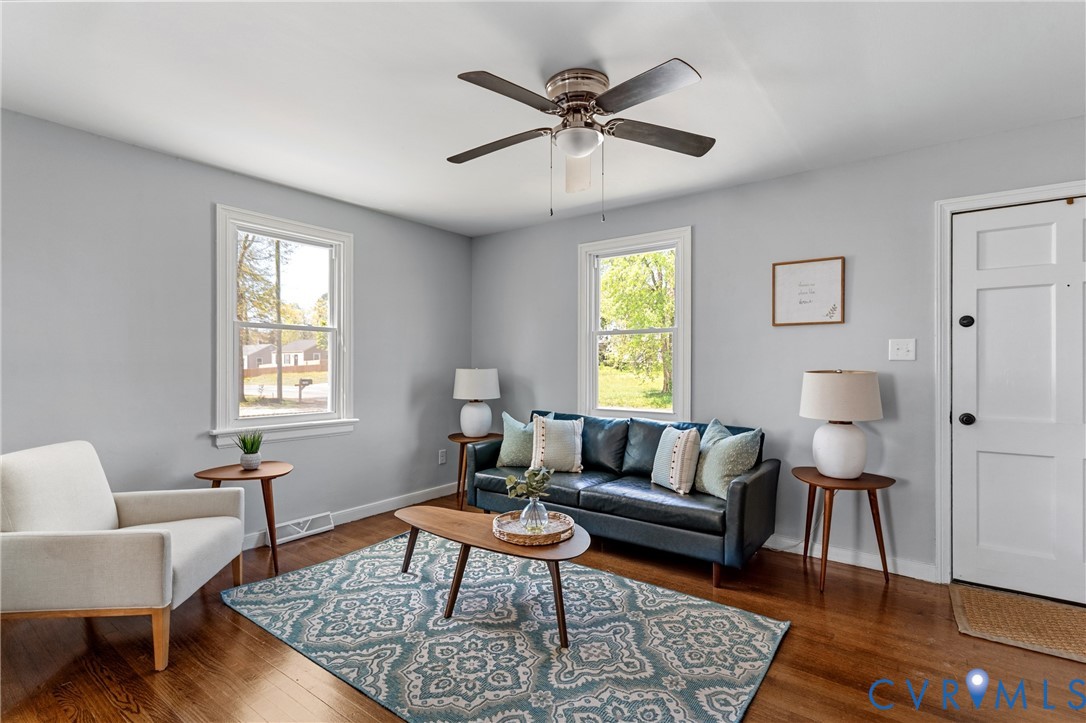 2700 Berry Road Richmond, VA 23234 - Photo 15 of 46 a living room with furniture and a rug