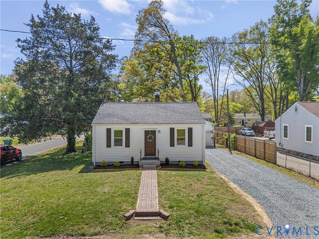 2700 Berry Road Richmond, VA 23234 - Photo 2 of 46 front view of a house with a yard