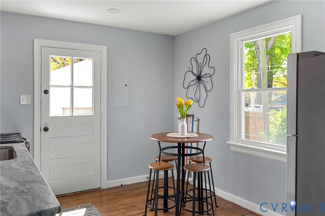 2700 Berry Road Richmond, VA 23234 - Photo 22 of 46 a view of a dining room with a table and chairs