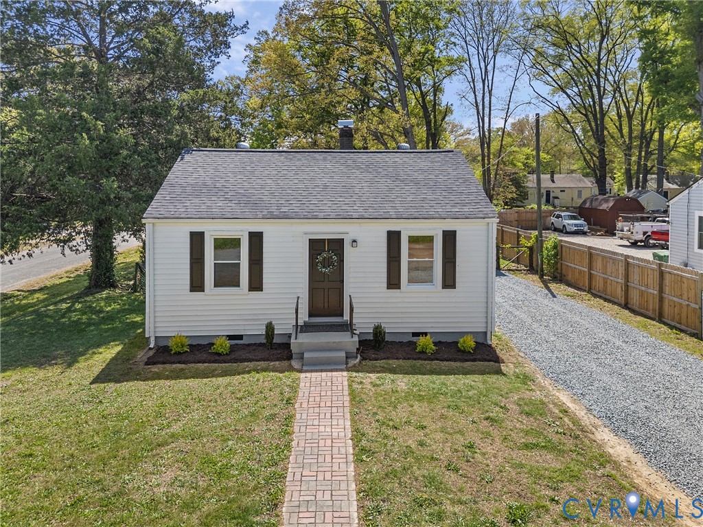 2700 Berry Road Richmond, VA 23234 - Photo 32 of 46 a view of a house with a yard