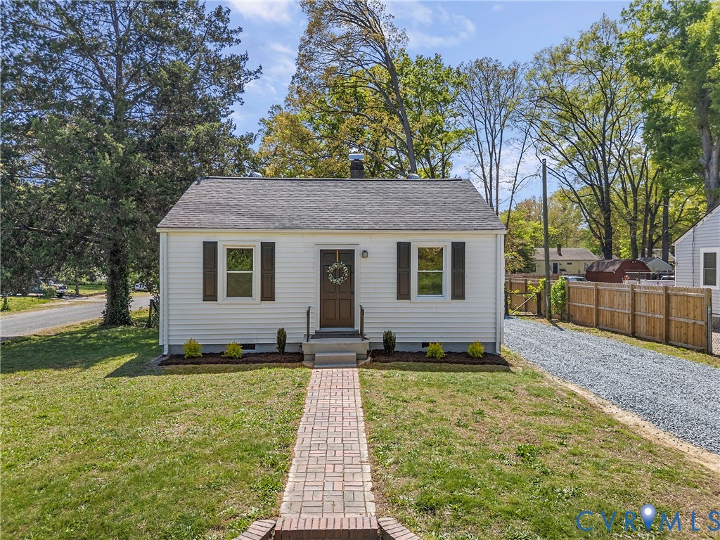 2700 Berry Road Richmond, VA 23234 - Photo 33 of 46 a front view of a house with a yard