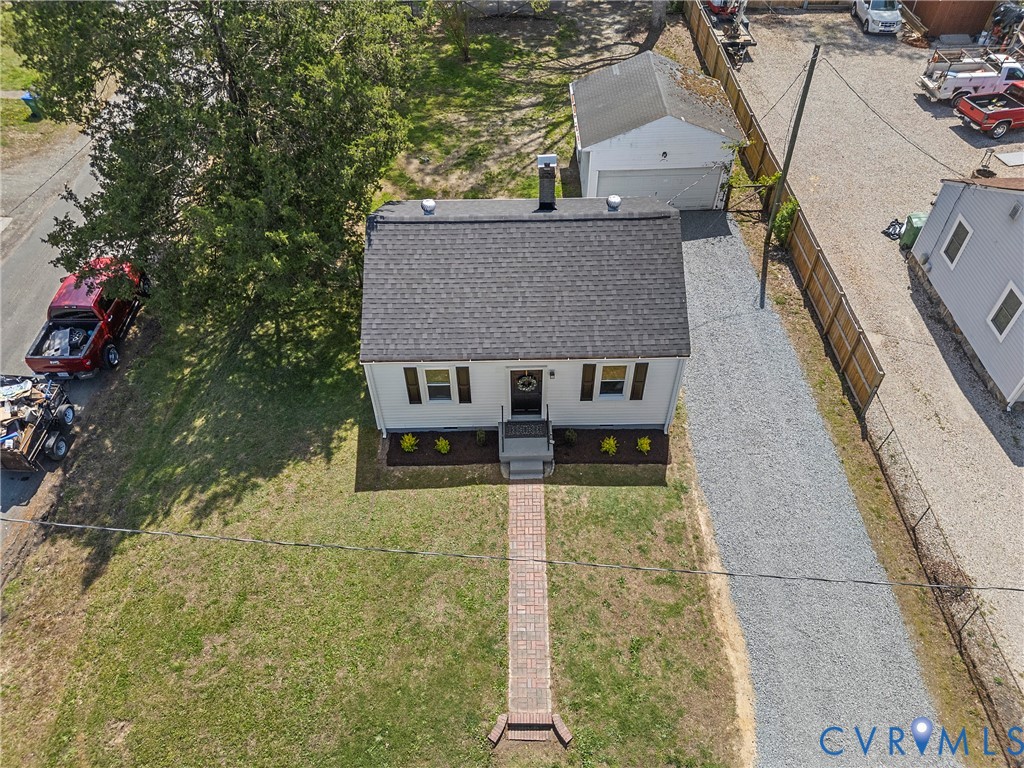 2700 Berry Road Richmond, VA 23234 - Photo 39 of 46 a house with trees in front of it