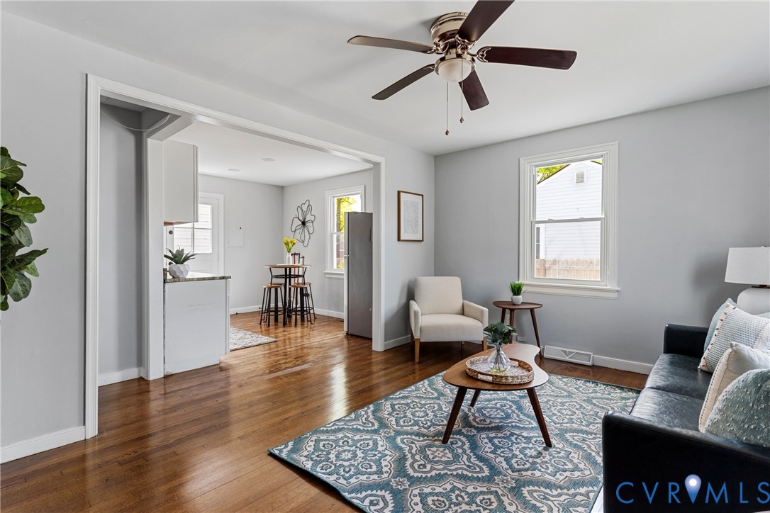 2700 Berry Road Richmond, VA 23234 - Photo 7 of 46 a living room with furniture and a wooden floor
