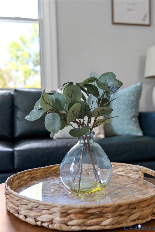 2700 Berry Road Richmond, VA 23234 - Photo 10 of 46 a vase of flowers sitting on a table