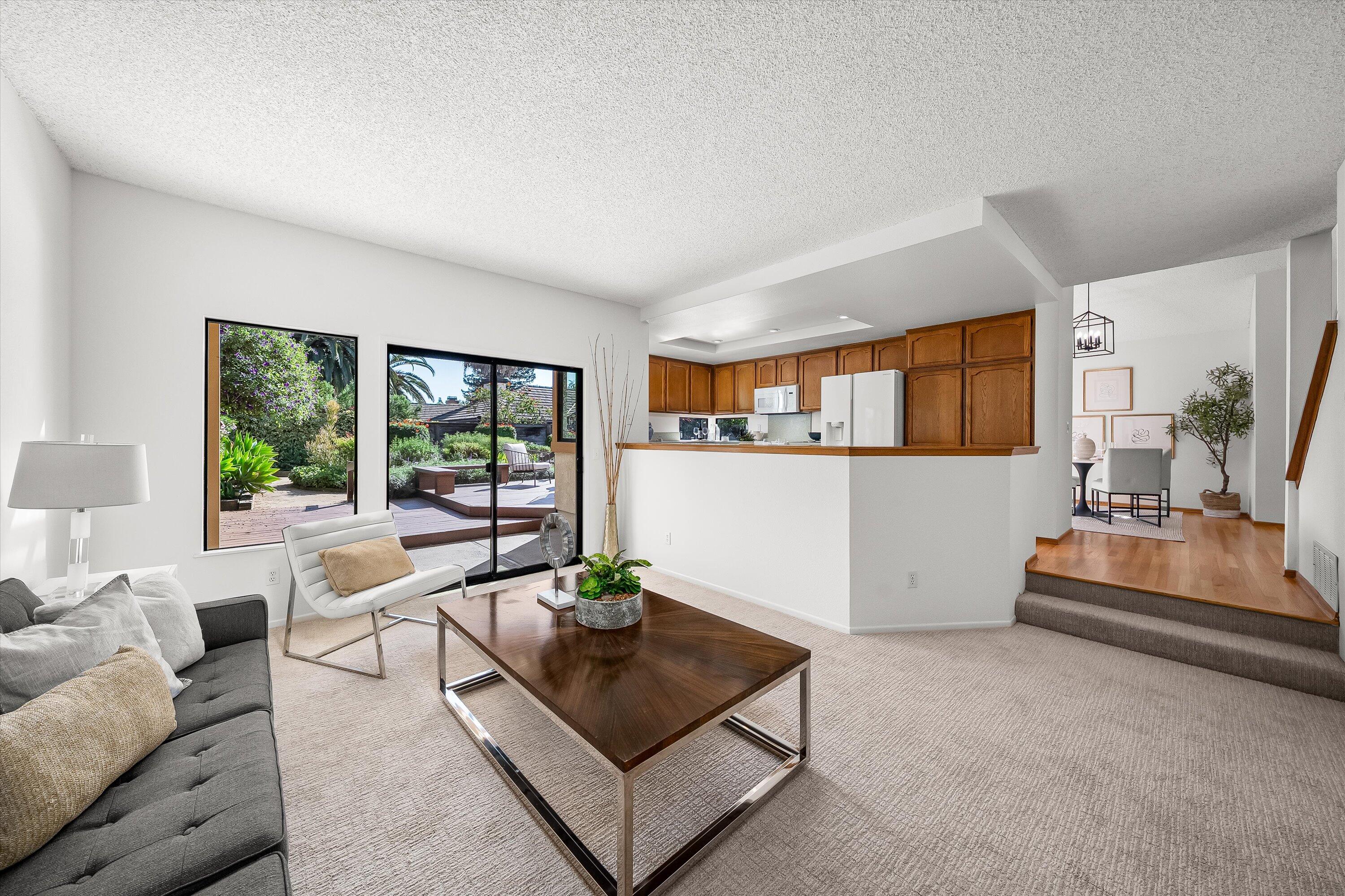 779 Dos Hermanos Road Santa Barbara, CA 93111 - Photo 11 of 33 a living room with furniture and a wooden floor