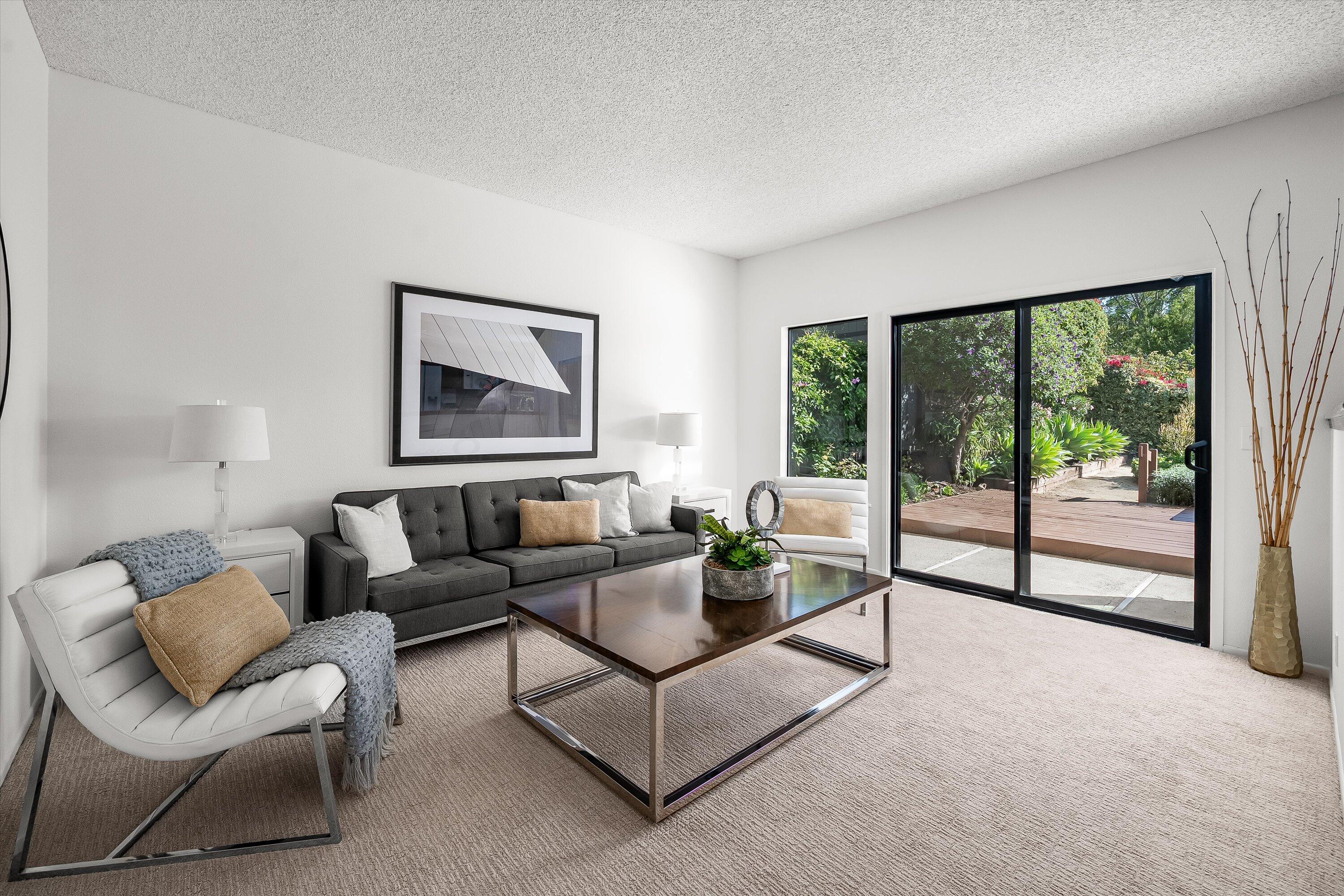 779 Dos Hermanos Road Santa Barbara, CA 93111 - Photo 12 of 33 a living room with furniture and a large window