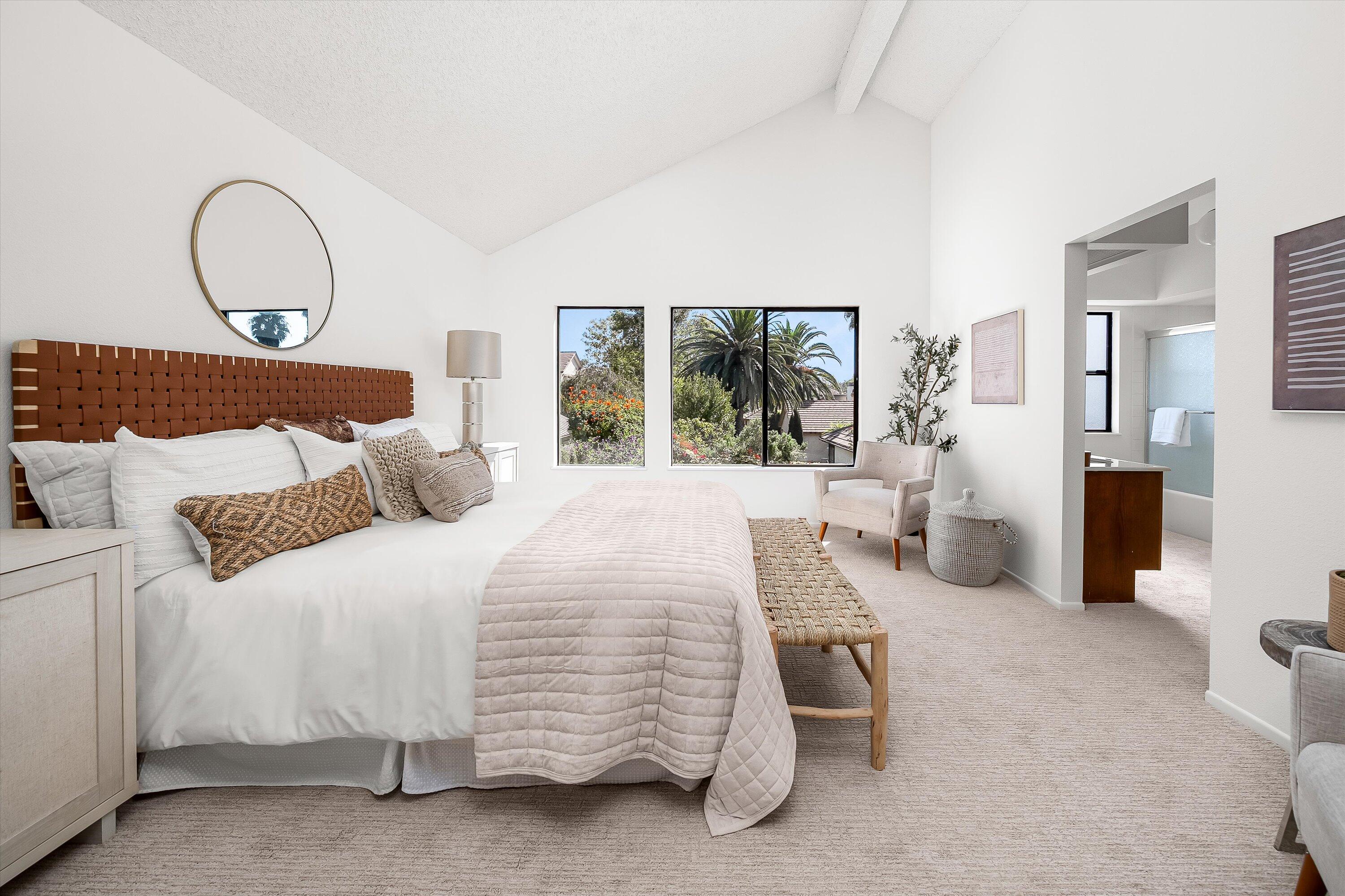 779 Dos Hermanos Road Santa Barbara, CA 93111 - Photo 13 of 33 a bedroom with bed and a large window