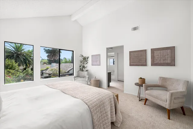 a bathroom with a double vanity sink and mirror