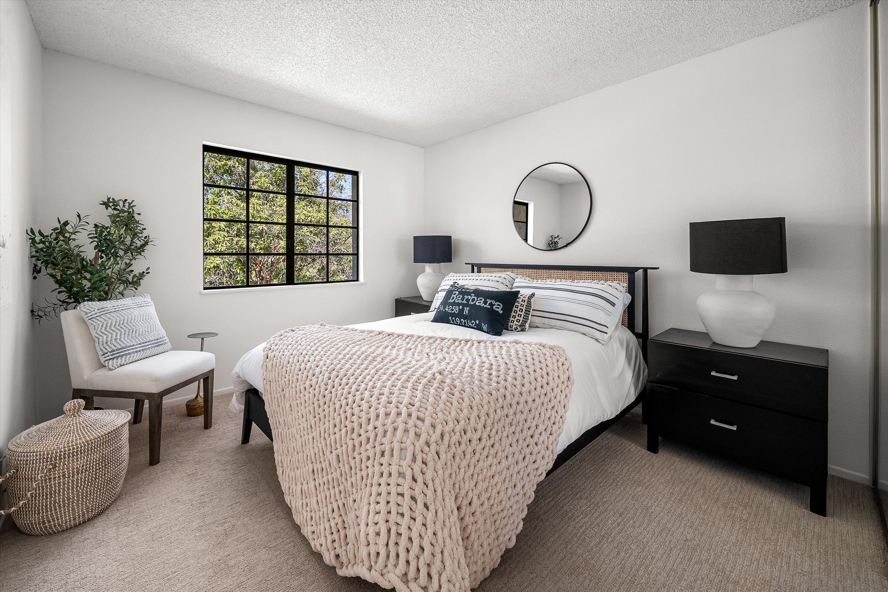 779 Dos Hermanos Road Santa Barbara, CA 93111 - Photo 18 of 33 a bedroom with a bed and a window