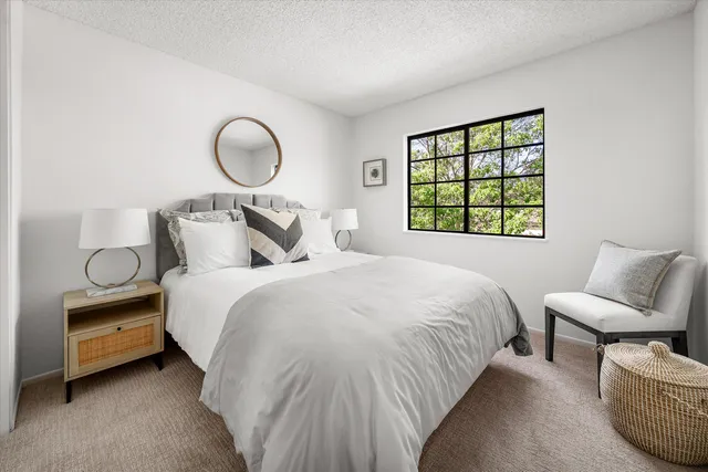 a bathroom with a sink toilet tub and shower