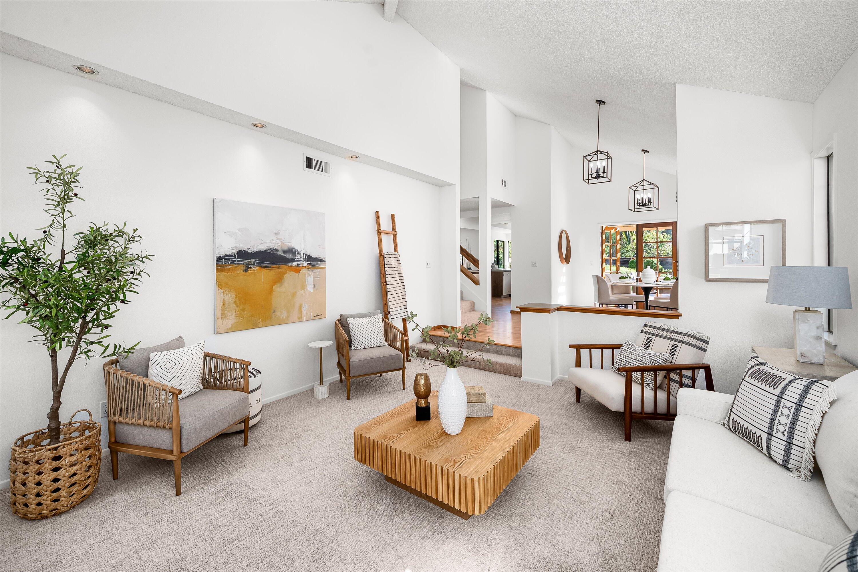 779 Dos Hermanos Road Santa Barbara, CA 93111 - Photo 6 of 33 a living room with furniture and a potted plant