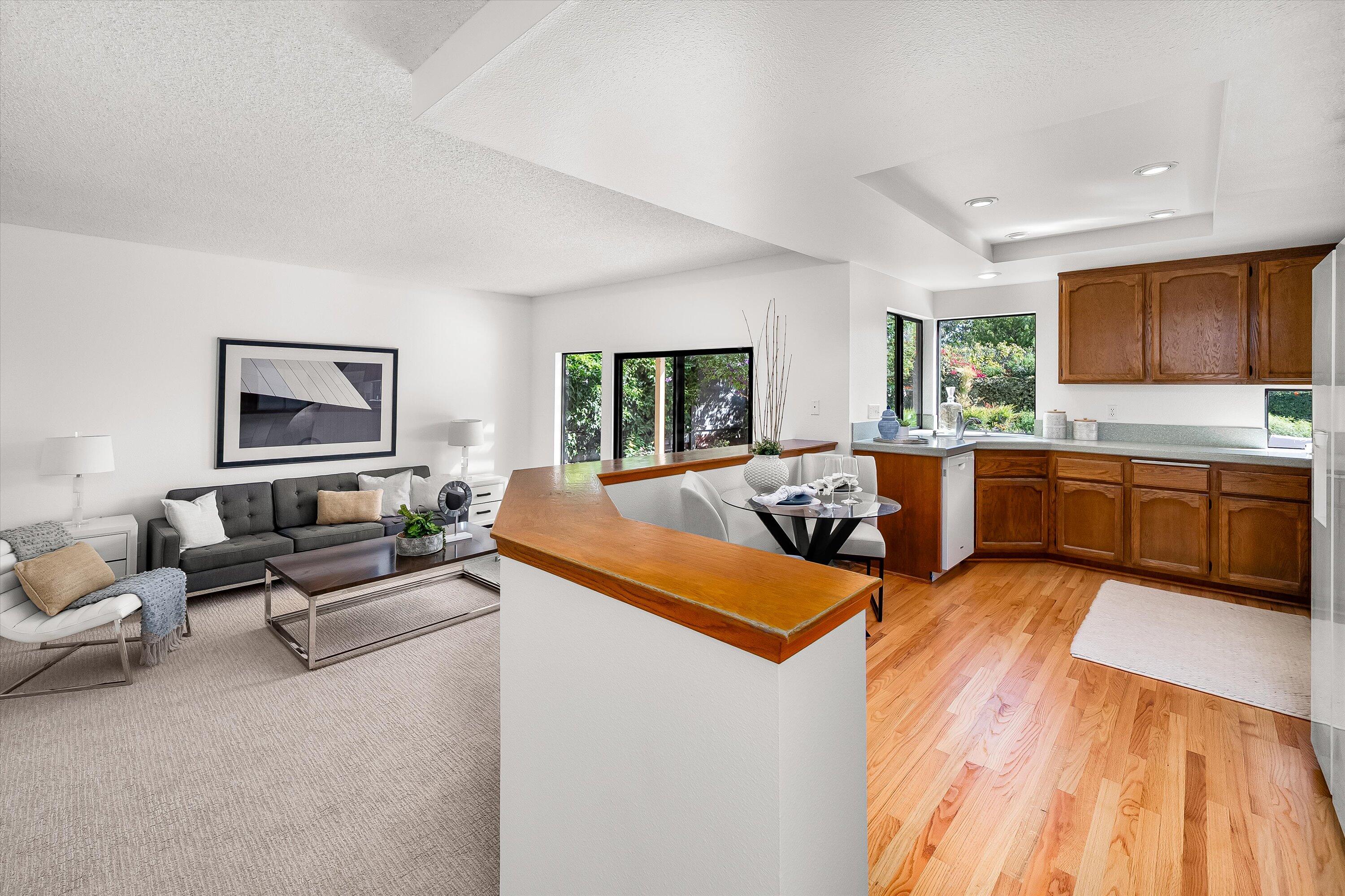 779 Dos Hermanos Road Santa Barbara, CA 93111 - Photo 8 of 33 a living room with furniture and a flat screen tv