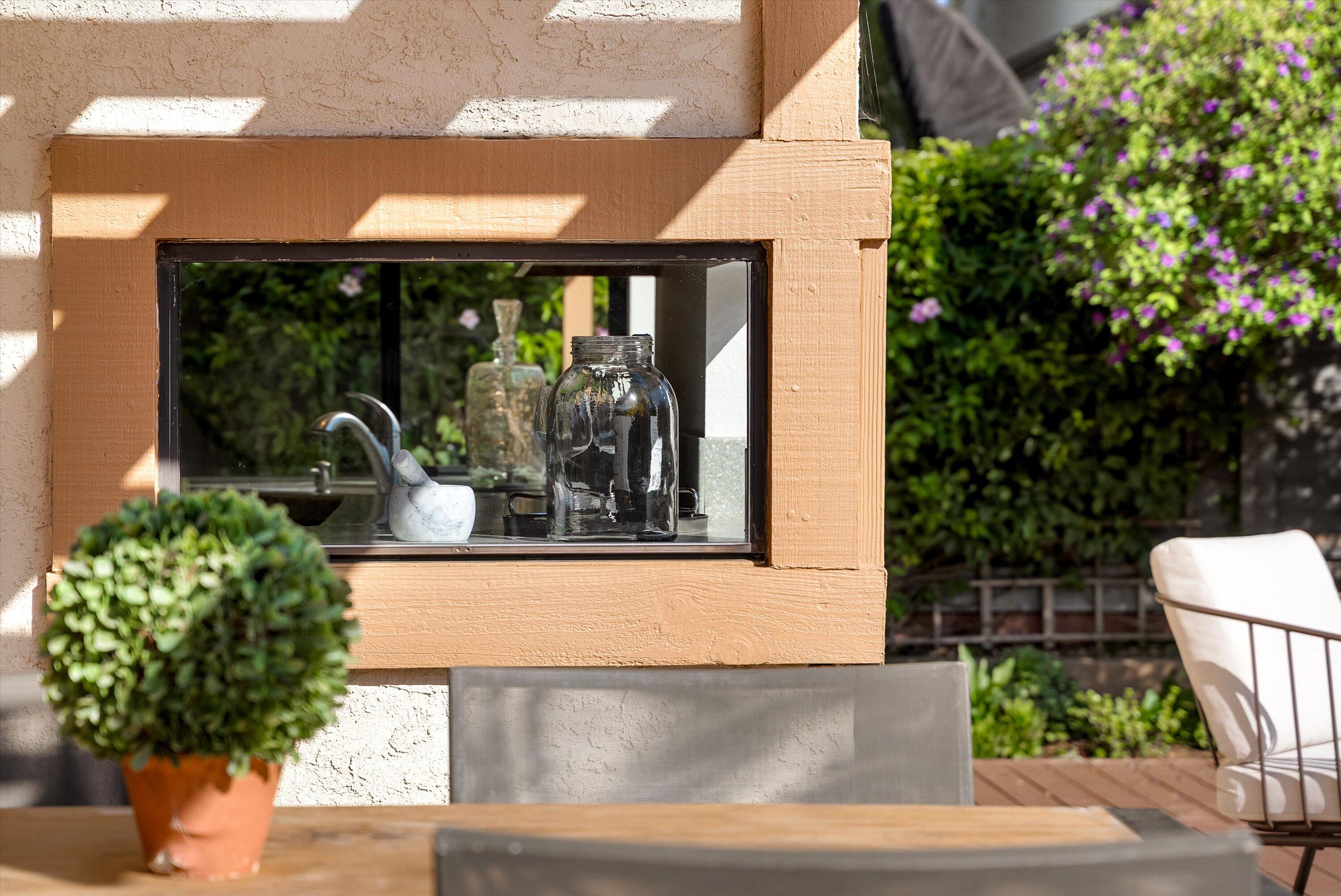 779 Dos Hermanos Road Santa Barbara, CA 93111 - Photo 9 of 33 a front view of a house with garden