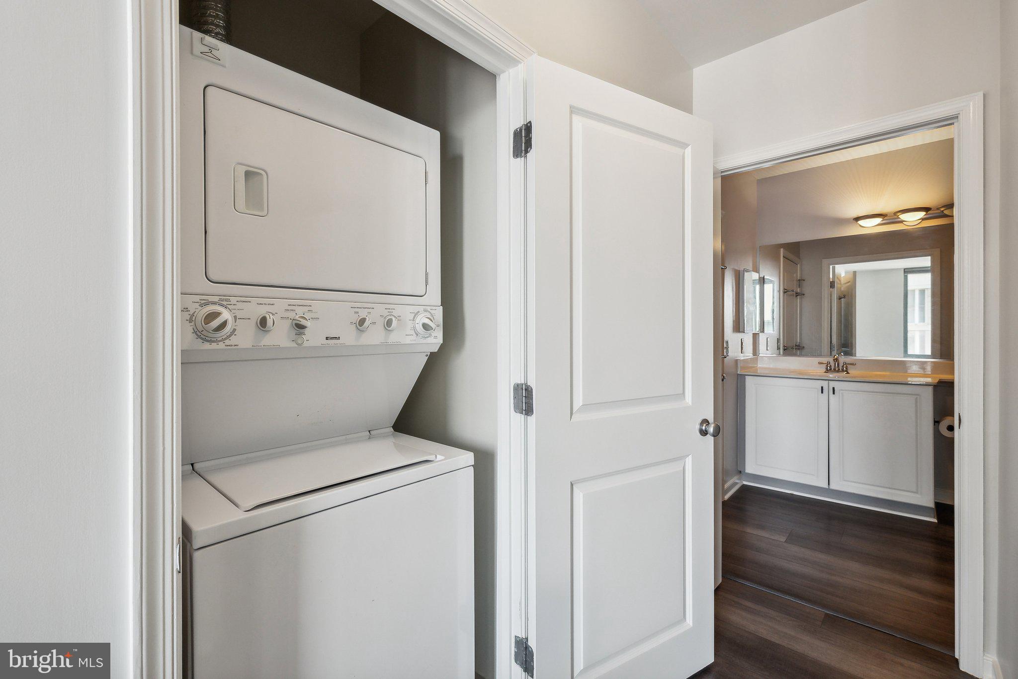 851 North Glebe Road, Unit 2008 Arlington, VA 22203 - Photo 22 of 37 Convenient laundry nook with modern appliances.