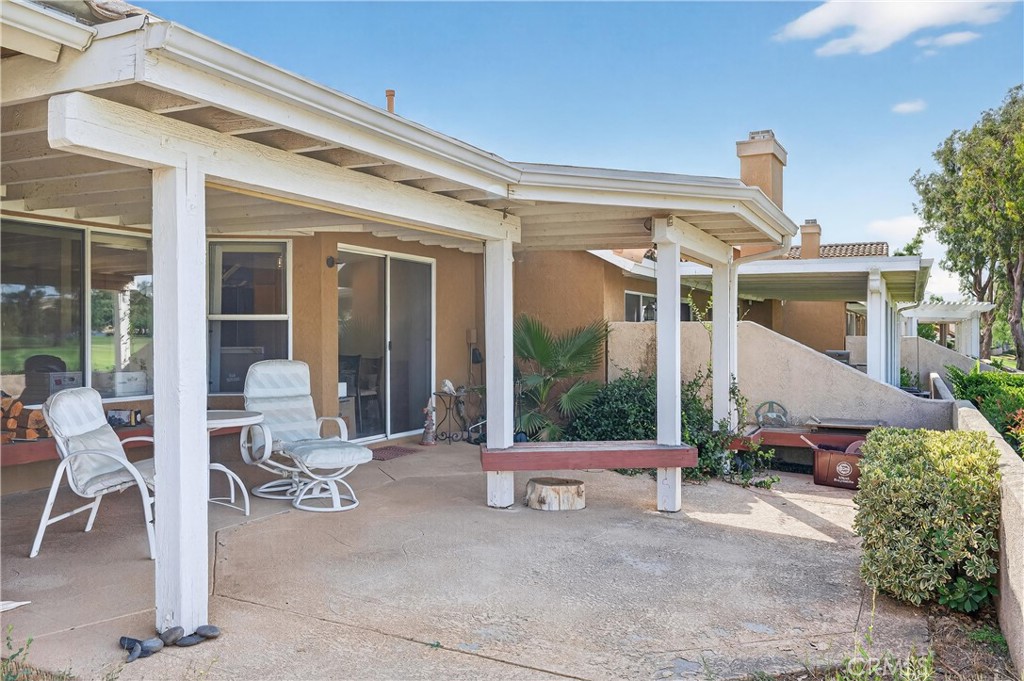 995 Hogan Avenue Banning, CA 92220 - Photo 15 of 25 a building outdoor space with patio furniture and potted plants