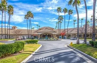 a view of swimming pool with a patio and a yard