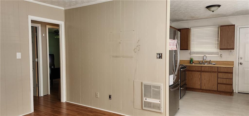 205 Glenview Terrace Winder, GA 30680 - Photo 12 of 29 a bathroom with a granite countertop sink and a mirror