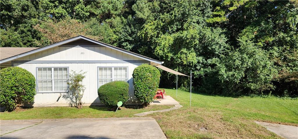 205 Glenview Terrace Winder, GA 30680 - Photo 7 of 29 a front view of a house with garden