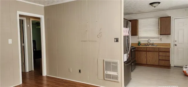 a view of cabinets with wooden floor