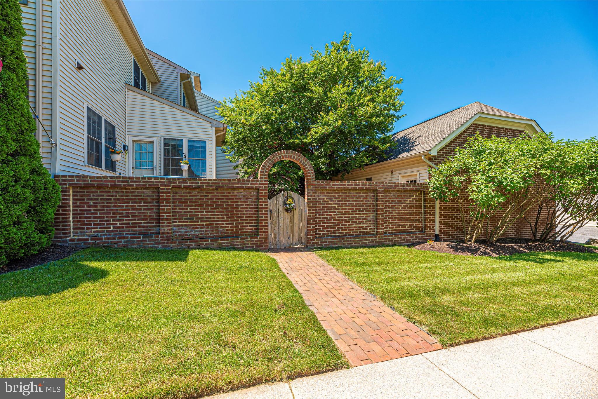 2220 Bear Den Road Frederick, MD 21701 - Photo 10 of 54 a front view of a house with a yard