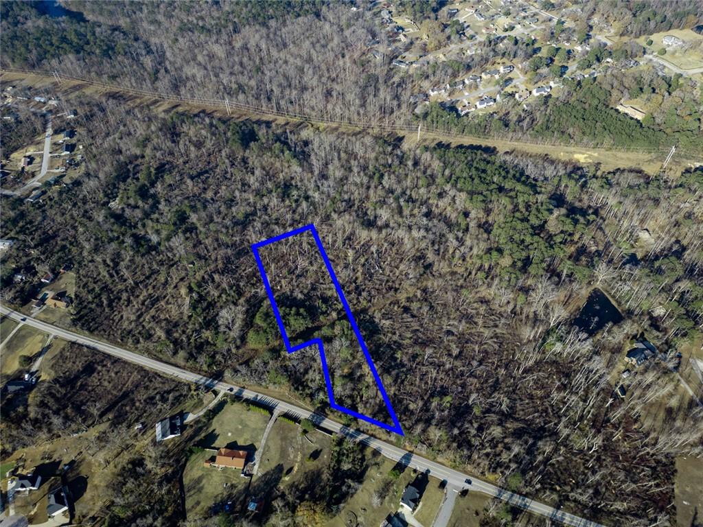 925 McDaniel Mill Road Southwest Conyers, GA 30094 - Photo 12 of 15 a view of outdoor space with seating and green space