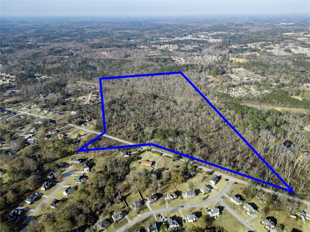 925 McDaniel Mill Road Southwest Conyers, GA 30094 - Photo 3 of 15 a view of a yard in a terrace