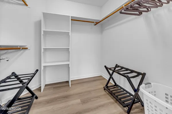 a view of a livingroom with furniture and workspace