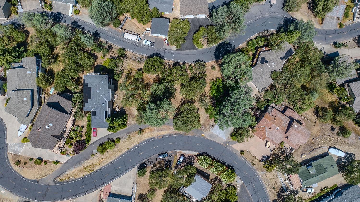 215 Oakhurst Court Copperopolis, CA 95228 - Photo 11 of 16 an aerial view of a swimming pool with outdoor space