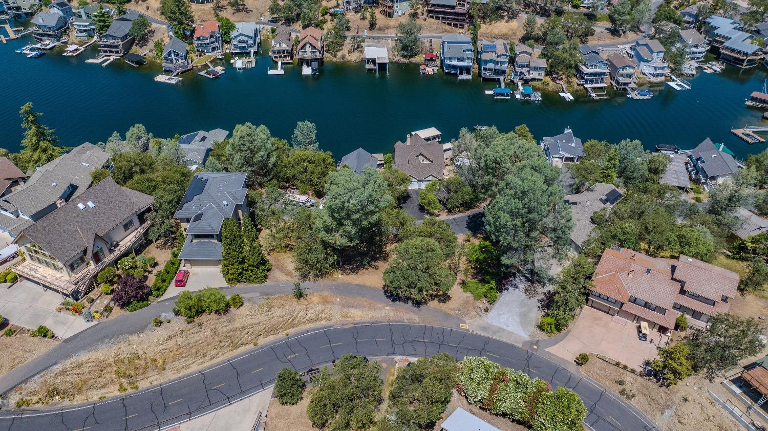 215 Oakhurst Court Copperopolis, CA 95228 - Photo 3 of 16 an aerial view of ocean and residential houses with outdoor space