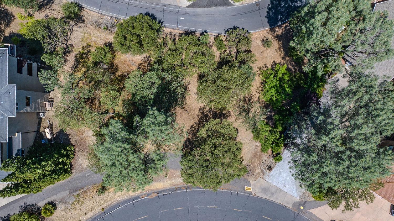 215 Oakhurst Court Copperopolis, CA 95228 - Photo 10 of 16 an aerial view of a house with a yard