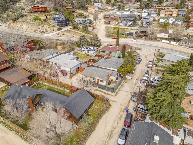 an aerial view of a house with outdoor space