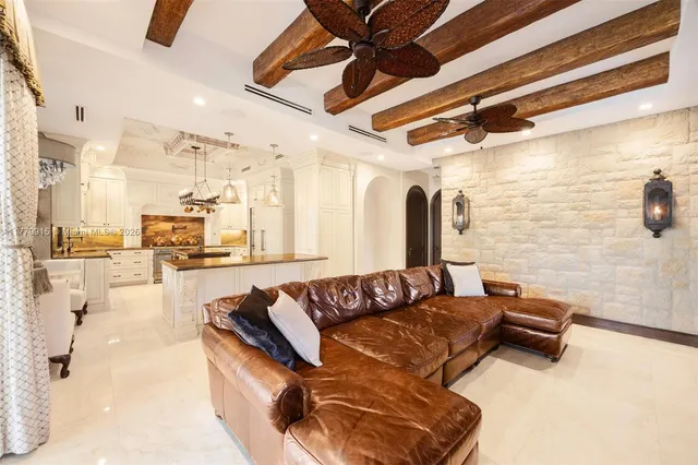 a living room with couch and a table