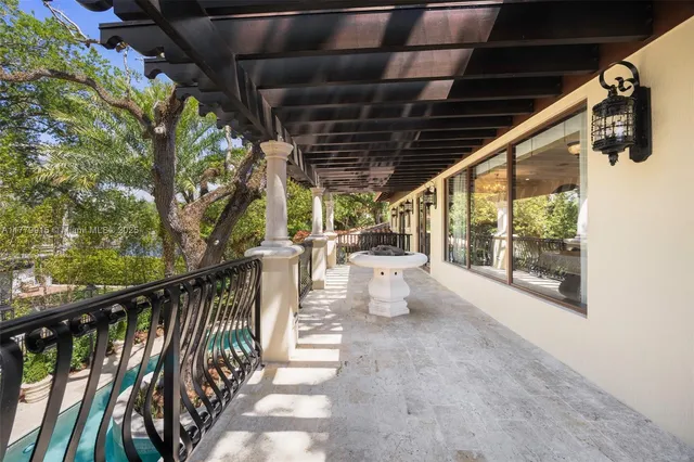a view of a porch with wooden floor