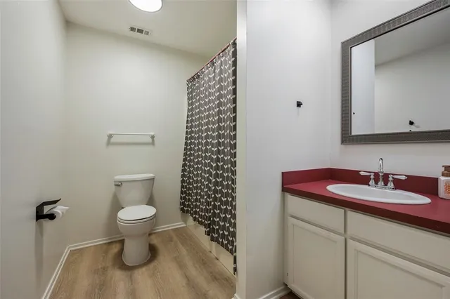 a bathroom with a sink and a toilet