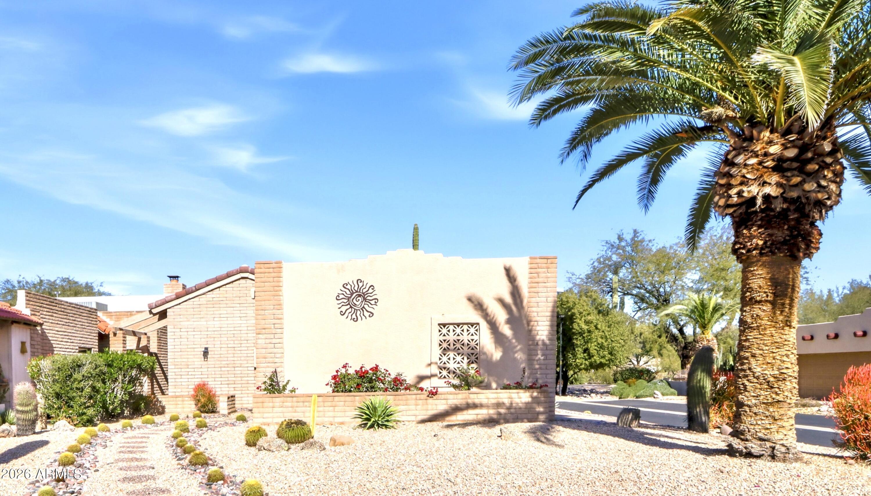 18814 East Loredo Lane Rio Verde, AZ 85263 - Photo 16 of 34 a view of a yard with snow on the road