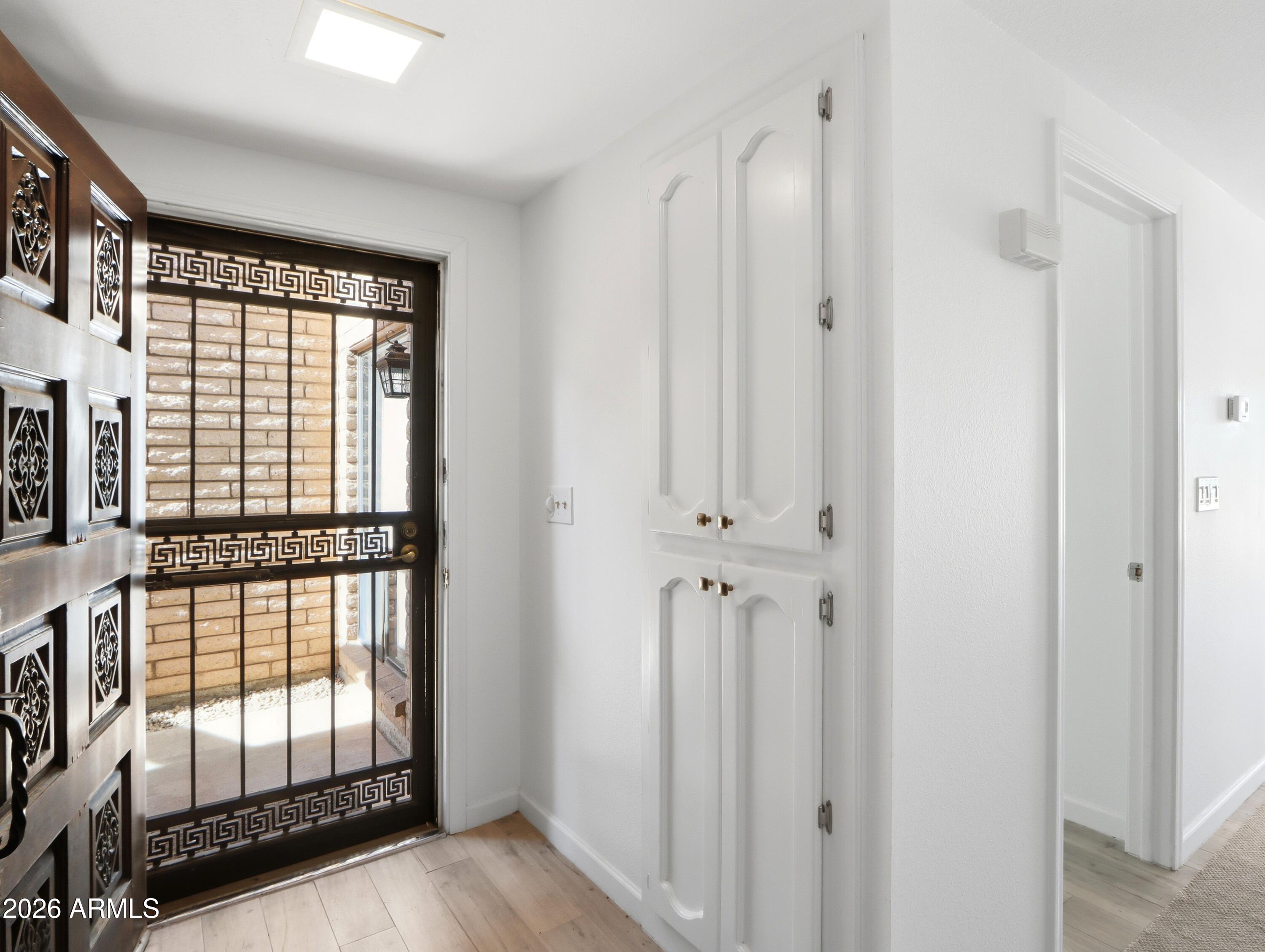 18814 East Loredo Lane Rio Verde, AZ 85263 - Photo 2 of 34 a view of entryway with wooden floor