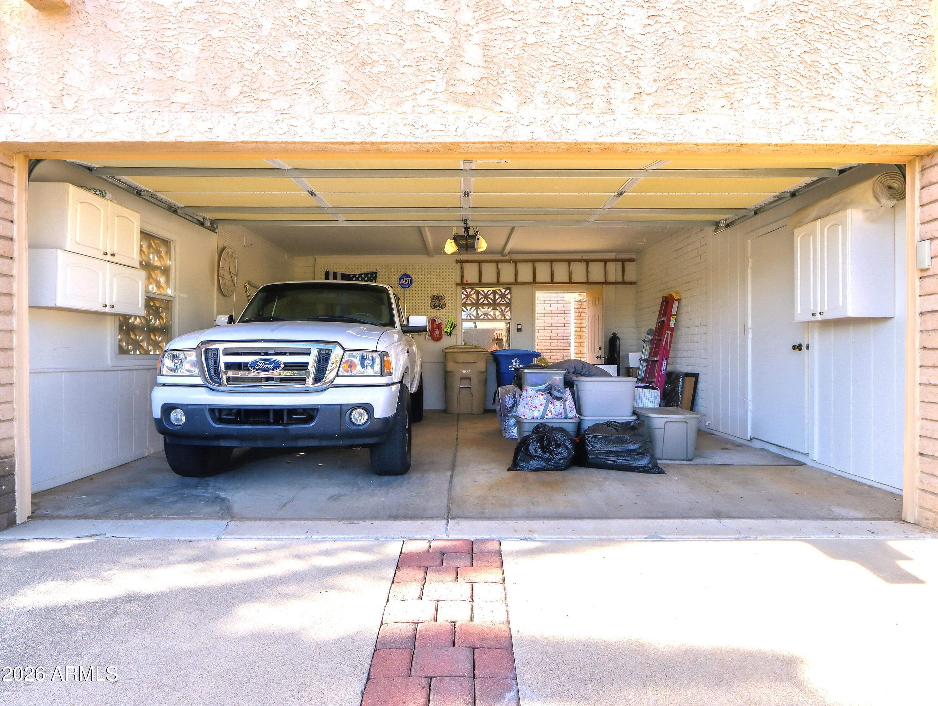 18814 East Loredo Lane Rio Verde, AZ 85263 - Photo 28 of 34 a view of car parked in garage
