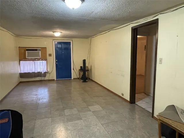 a view of room with furniture