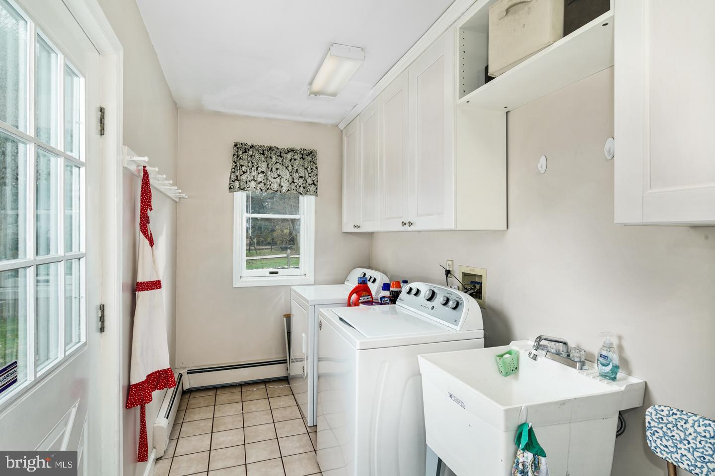 100 South Providence Road Wallingford, PA 19086 - Photo 18 of 56 Laundry room on main level off of kitchen