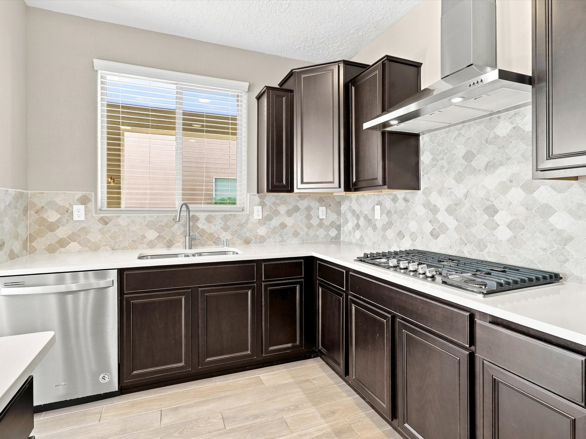 4642 Rail Runner Road Santa Fe, NM 87507 - Photo 17 of 74 Plenty of kitchen cabinetry provides generous storage for cookware, dishes, and everyday essentials.
