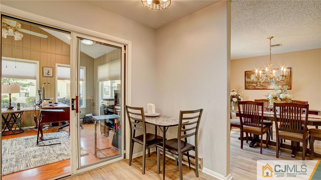 801 A Pompton Road, Unit 801A Monroe Township, NJ 08831 - Photo 14 of 33 a view of a dining room with furniture